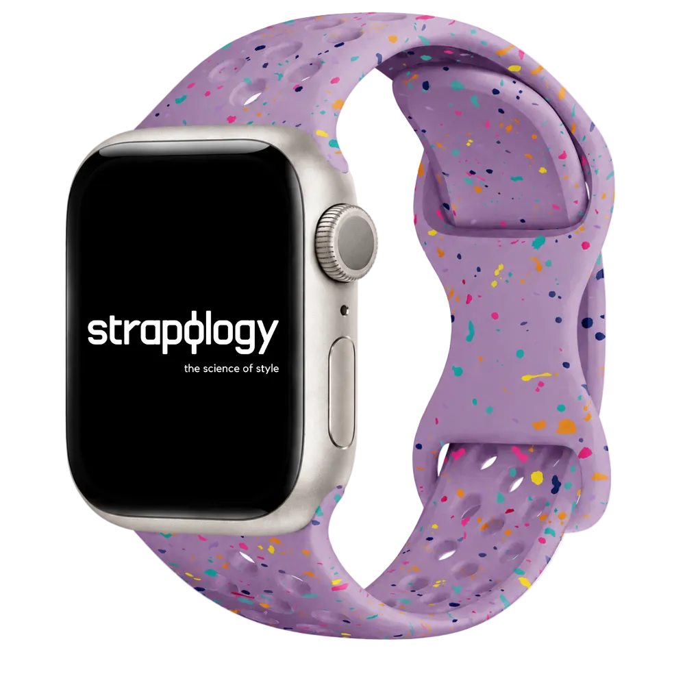 Smartwatch with a colorful speckled band on a white background, featuring the brand 'Straplogy'.